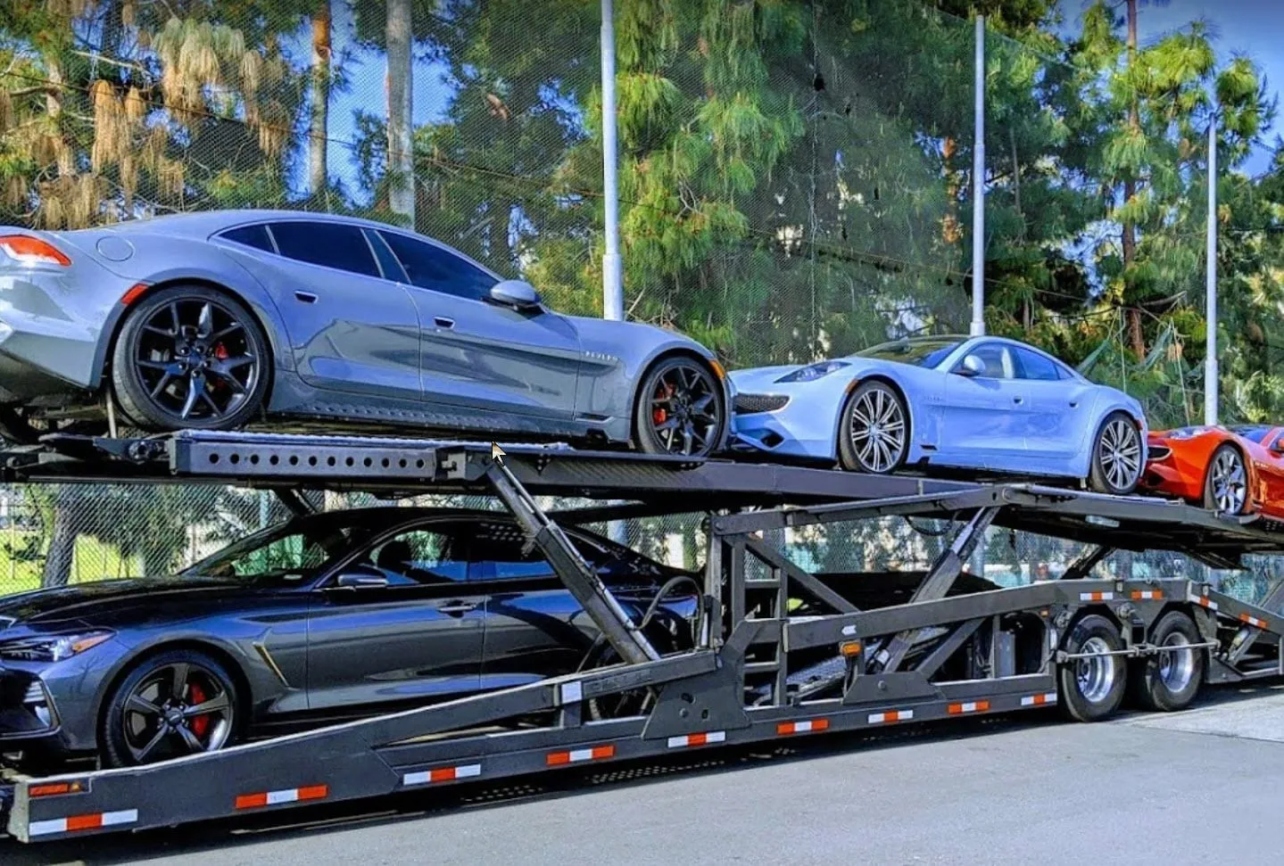 Car being loaded onto a truck by Nationwide Car Carrier